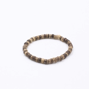 Ethnic style beaded bracelet with dark brown wood and coconut shell cylinders