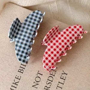 Classic checkered pattern acetate hair claw clips in blue and red vintage plaid style