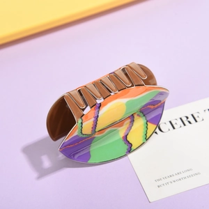 Creative abstract colorful hair claw clip with orange and purple fluid resin patterns