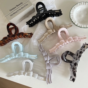Bow-shaped jelly color hair claws in eight elegant finishes for thick hair styling