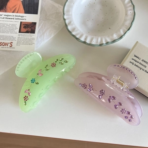 Elegant floral rhinestone acetate hair claw clips in pastel green and soft pink lavender