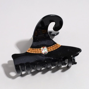 Pinza per capelli a forma di cappello da strega nero glitterato con strass arancioni