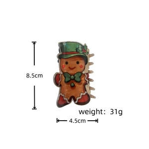 Détail des dimensions de la pince à cheveux bonhomme de pain d'épices 8,5 x 4,5 cm
