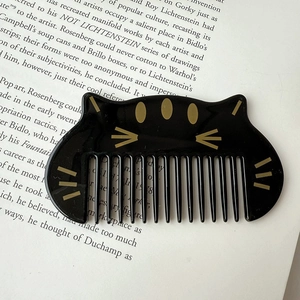 Portable cartoon black cat hair comb with cute gold cat ears and anti-static design