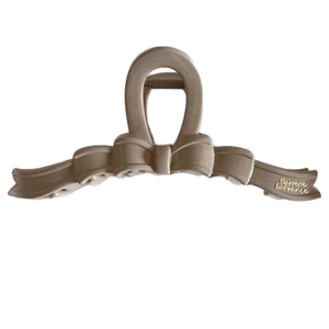 Elegant jelly-colored bow hair claw clip in khaki resin with Barrette La France gold lettering