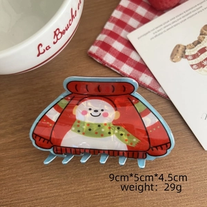 Vue détaillée de la pince à cheveux bonhomme de neige de Noël avec dimensions et décor