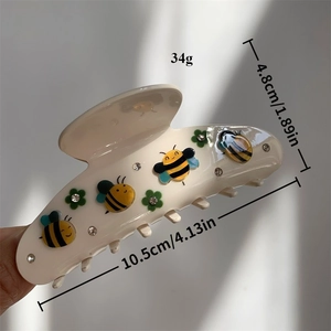 Pince à cheveux beige avec abeilles en cristal et motifs trèfles de haute qualité
