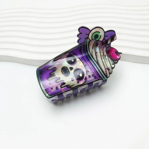 Creative Halloween hair claw clip featuring spooky skull milkshake cup design with eye detail