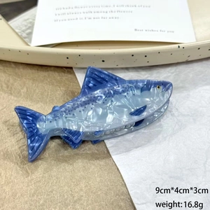 Blue and white marble pattern shark hair claw clip measuring 9cm by 4cm for women