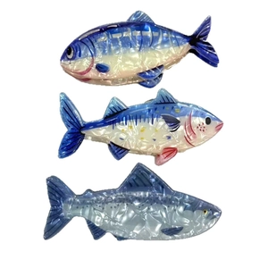 Creative acetate fish claw clips set in blue marble patterns for ocean themed hair styling