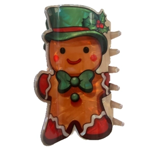 Pince à cheveux bonhomme de pain d'épices avec chapeau de Noël pour coiffure festive