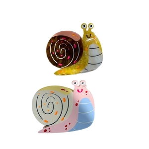 Polished acetate hair claw clips in colorful snail shapes with polka dot patterns