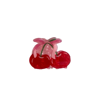 Cute cherry shaped hair claw clip in red and pink with a sweet bow decorative accent