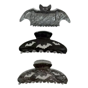 Gothic bat hair claw clips in marble grey and glitter black for Halloween hairstyles