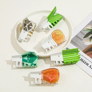 Creative acetate shark hair clips in a six-piece set with vibrant geometric patterns