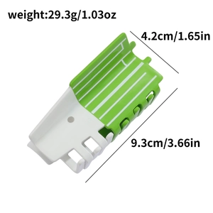 Detail view of the green shark hair clip with weight and dimension measurements