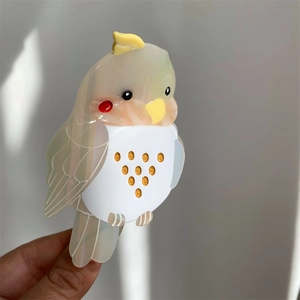 Cockatiel bird acetate hair claw clip with vibrant red cheeks and golden dots