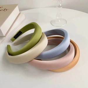 Padded satin headbands in candy colors with handmade label for high cranial top look