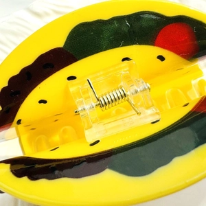 Pince à cheveux amusante en forme de taco en acrylique jaune avec détails colorés