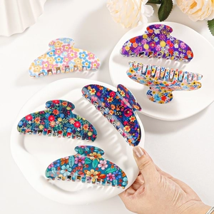 Floral print hair claws set with colorful daisy patterns for elegant hair styling