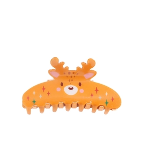 Cute orange reindeer hair claw clip with colorful stars for festive Christmas styling