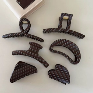 Brown striped 6-piece hair claw clip set in various geometric shapes for women
