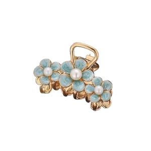 Elegant gold alloy flower hair claw with light blue petals and pearl accents