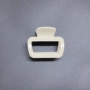Minimalist cream white rectangular hair claw clip with glossy resin finish for women