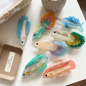 Elegant ocean fish hair claws in colorful acetate for stylish women's updos