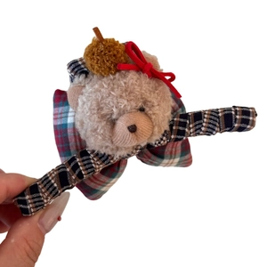 Plush bear hair claw clip with red ribbon and checkered bow for winter hair styling