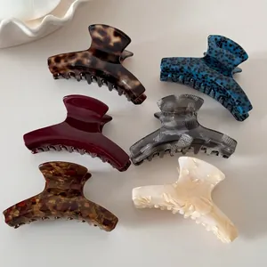 Set of 6 vintage acetate hair claws in various marble and tortoiseshell patterns