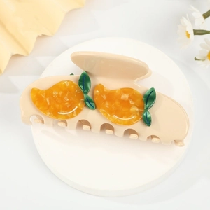 Elegant cream mango hair claw clip for women featuring yellow fruit and green leaves details