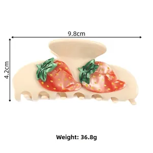 Detail view showing dimensions of strawberry claw clip 9.8cm length and 4.2cm height