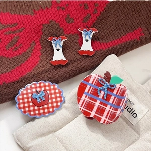 Cute red and white checkered apple hair claw and clip set with blue bow accents