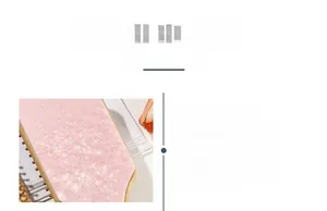 Macro view of pink marble texture acetate patch design on wooden hairbrush handle