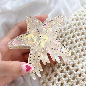 Starfish hair claw clip in pearlescent white acetate with sparkling rhinestones