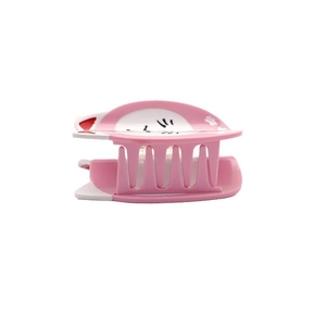 Detailed view of pink and white cat hair claw clip with cute facial print and spring design