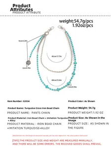 Detail of double-layer hip hop trousers chain with turquoise beads and cross pendants