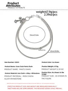 Detail of silver double layered hip-hop pants chain with rhinestone cross pendant