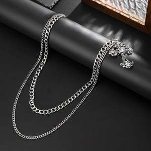 Mens double layered silver metal chain necklace with sparkling iced out cross pendant