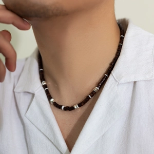 Men's wooden bead necklace with silver metal accents and bohemian clay discs