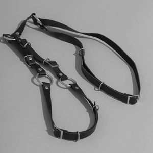 Men's punk black leather body chest harness with silver metal rings and buckles