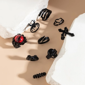 Set de 9 anillos punk góticos para hombre en metal negro con calaveras y diseño de ojo rojo