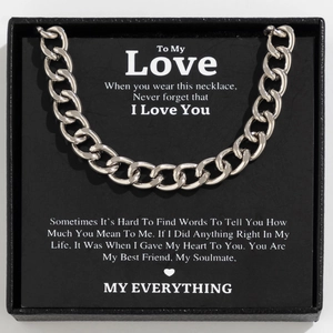 Silver Cuban link necklace in a black gift box with a romantic sentiment card