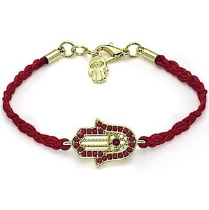 Close-up of handmade red braided Hamsa Hand bracelet with gold-plated charm and tiny crystals