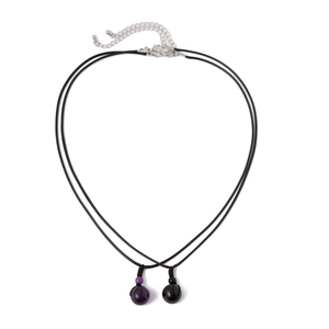 Dual necklace set featuring purple and black stone pendants with adjustable cords