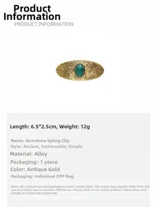 Detail view of retro alloy hair clip with green gemstone and floral engraving, 6.5x2.5cm