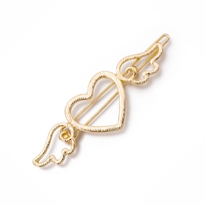 Golden heart wing hair clip with hollow alloy design and brushed metal texture