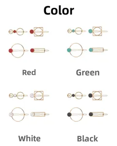 Detail view of gold alloy geometric hair clips set with colorful marble stone patterns