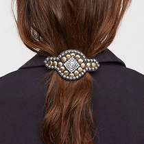 Minimalist geometric rectangular hair clip with vintage beads worn on a brunette ponytail